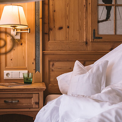 Bett in einer Unterkunft in Ischgl Zentrum 4*S Hotel Solaria